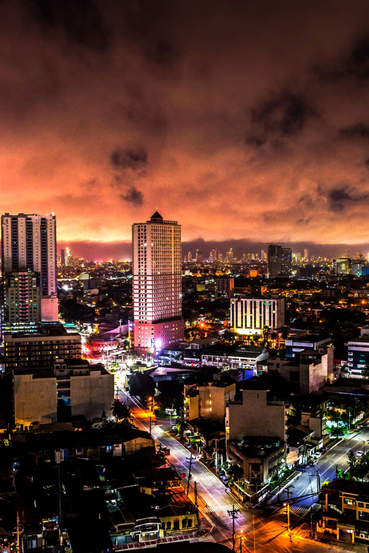 Manila skyline glowing at dusk