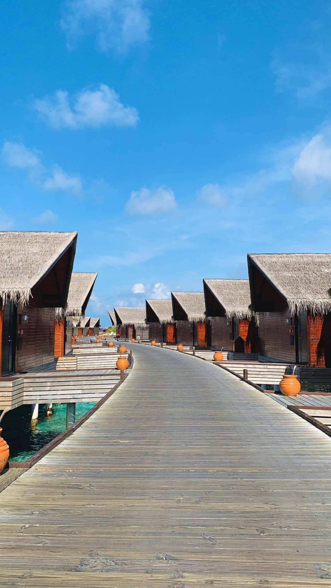 Overwater villa boardwalk at Sun Siyam Olhuveli
