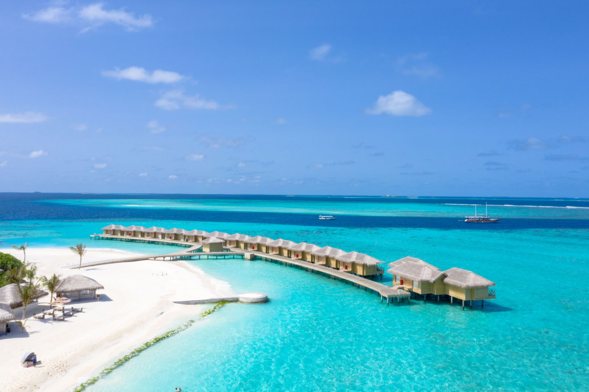 Sun Siyam Olhuveli villas across turquoise water